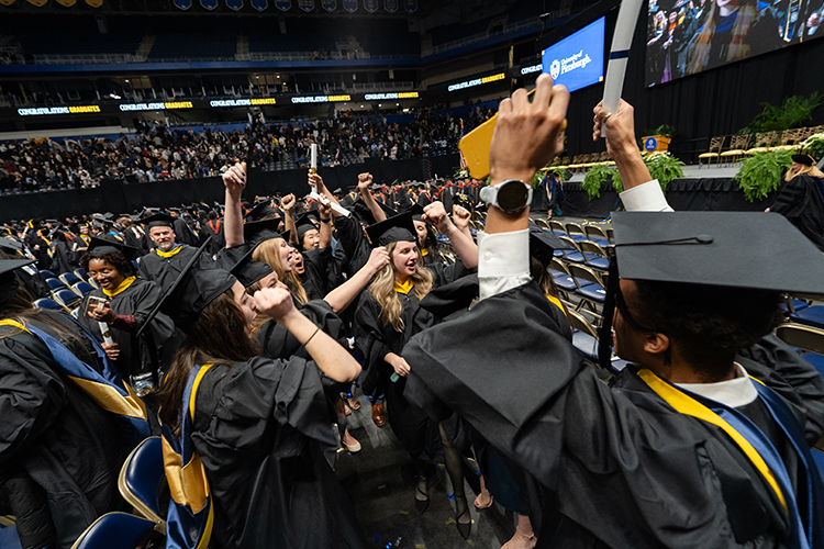 4.	Pitt Health Sciences graduates celebrating at the Pitt 2024 Winter Commencement at the Petersen Events Center. (Photo by Rayni Shiring)